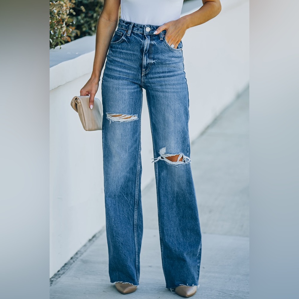 High rise distressed raw hem jeans
